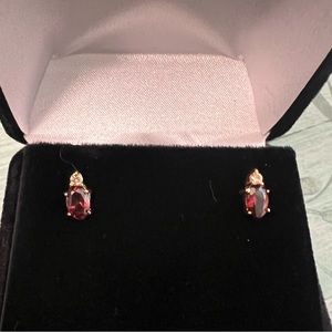 Cute earrings. Smoke amber colored stones with diamonds in 14k yellow gold.